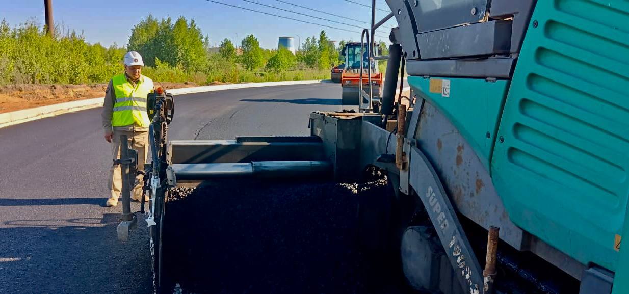 В Ленобласти на транспортной развязке между Мурманским шоссе и Кудрово стартовали работы по укладке асфальтаК строительству н...