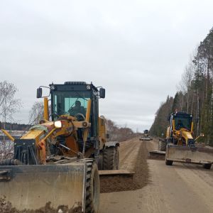 Планировку гравийного покрытия а/д Архангельск - Б...